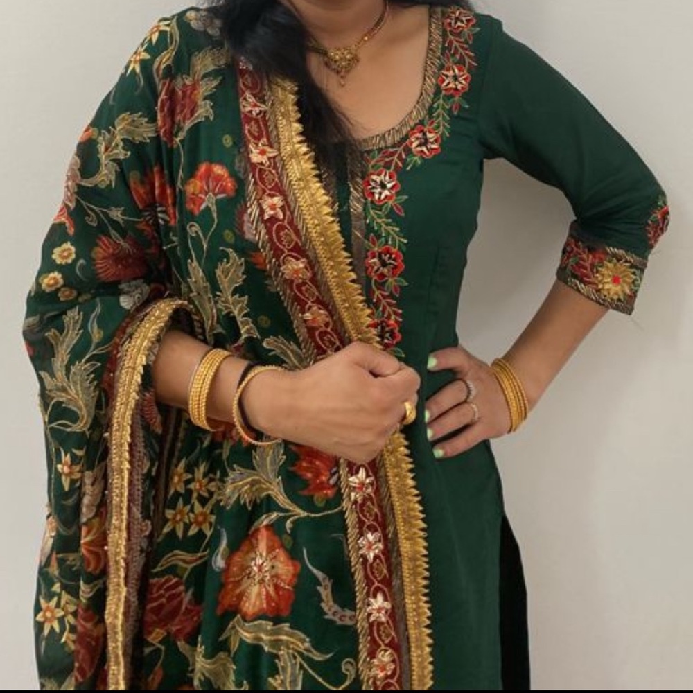 Beautiful Indian pant suit in dark green color